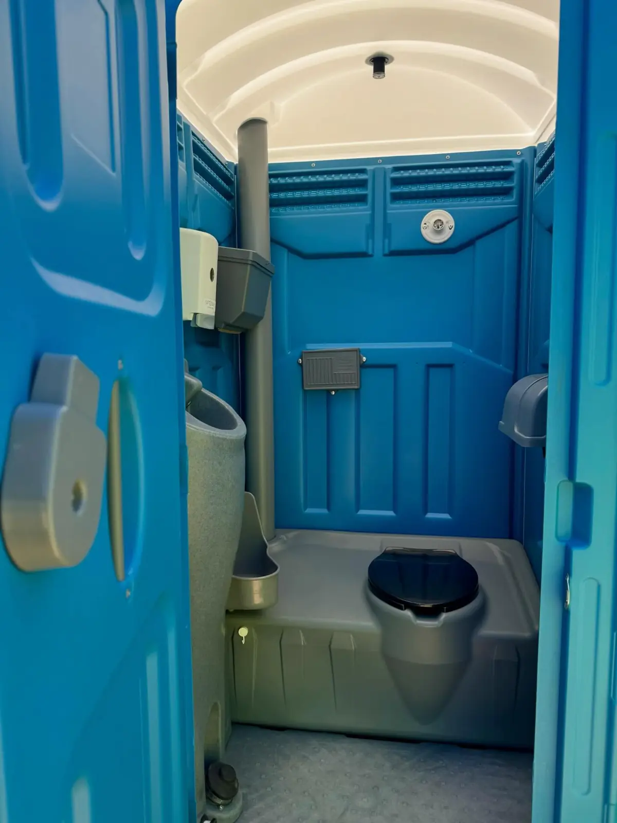 Clean standard porta potty interior